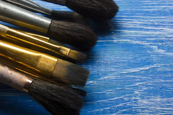 Painting tools colour palette and Artist paint brushes on abstract artistic background — Stock Photo, Image