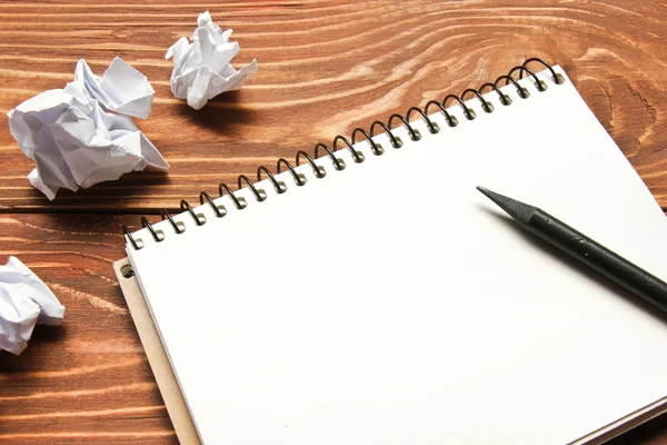 Office desk table with supplies and crumpled paper. Top view. Copy space for text — Stock Photo, Image