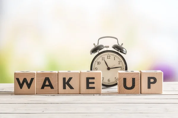 Wake up message with a classic alarm clock — Stock Photo, Image