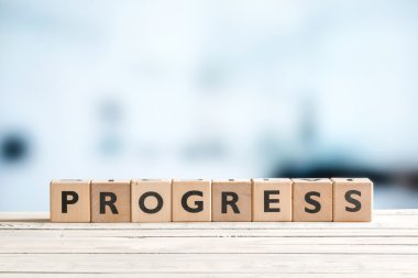 Ahşap küpleri ile ilerleme kelime yazıldığından