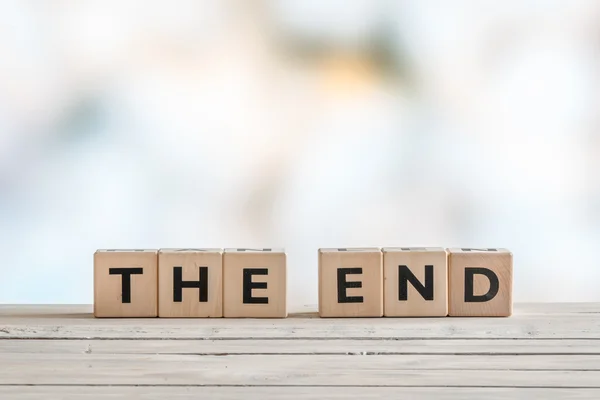 The end sign with wooden blocks — Stock Photo, Image