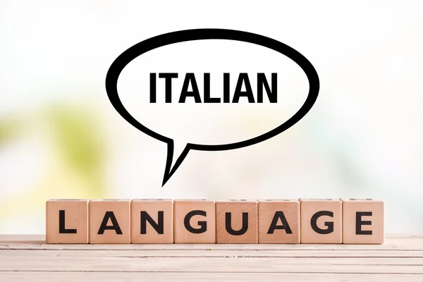 Segno di lezione di lingua italiana su un tavolo — Foto Stock