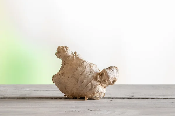 Ginger root on a wooden table — Stock Photo, Image