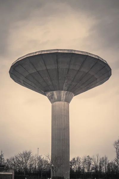 Water tower in cloudy weather — Stock Photo, Image