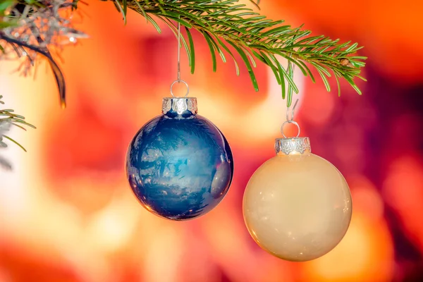 Shiny xmas baubles on a tree — Stock Photo, Image