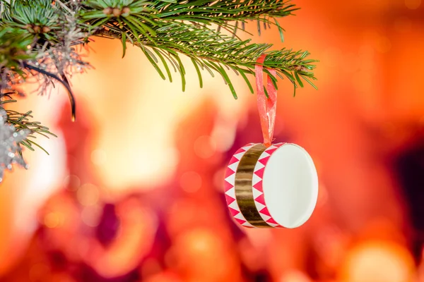 Drum hanging on a Christmas tree — Stock Photo, Image