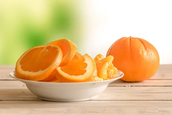 Oranžové ovoce v míse — Stock fotografie