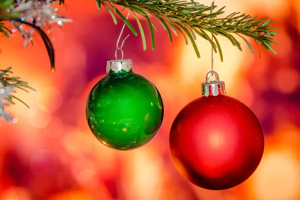 Red and green xmas baubles — Stock Photo, Image