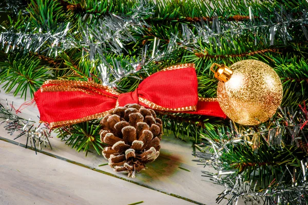 Christmas bauble and a ribbon — Stock Photo, Image