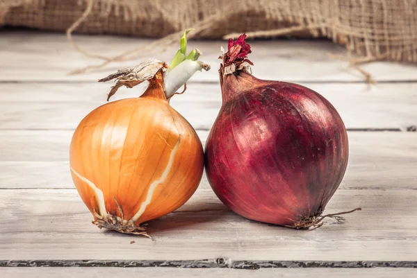 Onions on a wooden table