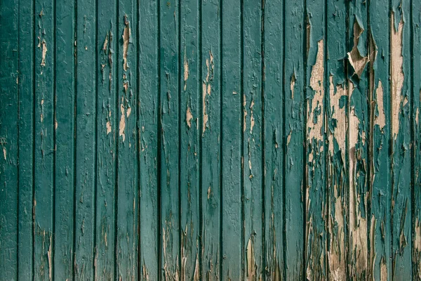 Holzgrund mit abgenutzter Farbe — Stockfoto