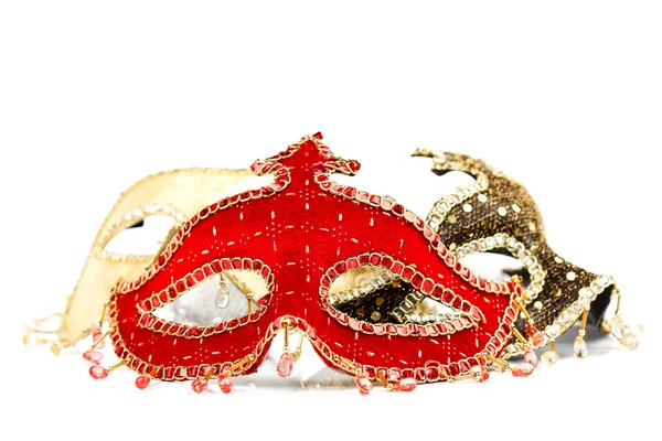 Red carnival mask in the front — Stock Photo, Image