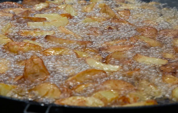 potatoes are fried in oil. Freshly cooked popular food. Side dish