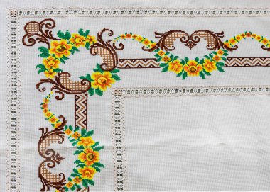 Çapraz dikiş ürünleri folklorik süsler ve tuvale işlenmiş desenler. keten kumaş.