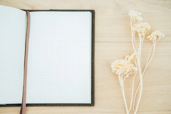 Line paper notebook open on wood texture background — Stock Photo, Image