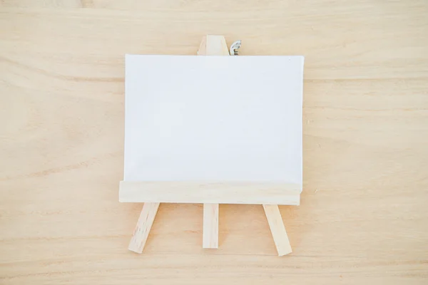 Białe płótno sztuki zarządu na drewno tekstura tło — Zdjęcie stockowe