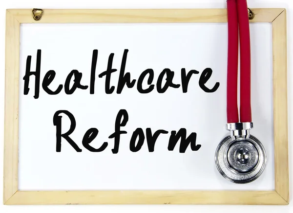 Texte de réforme des soins de santé écrire sur tableau noir — Photo