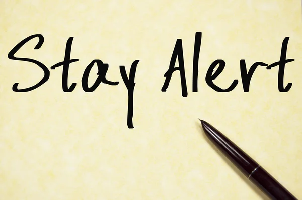 Stay alert text write on paper — Stock Photo, Image