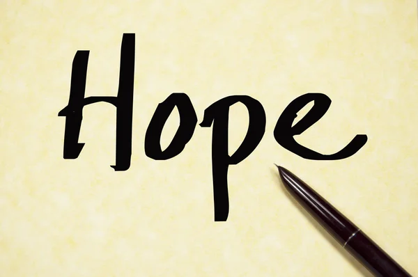 Ελπίδα η λέξη γράφουν σε χαρτί — Φωτογραφία Αρχείου