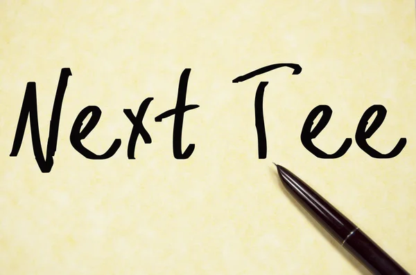 Next tee text write on paper — Stock Photo, Image