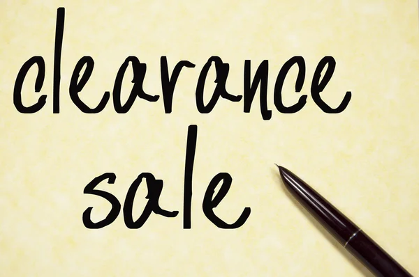 Clearance sale text write on paper — Stock Photo, Image