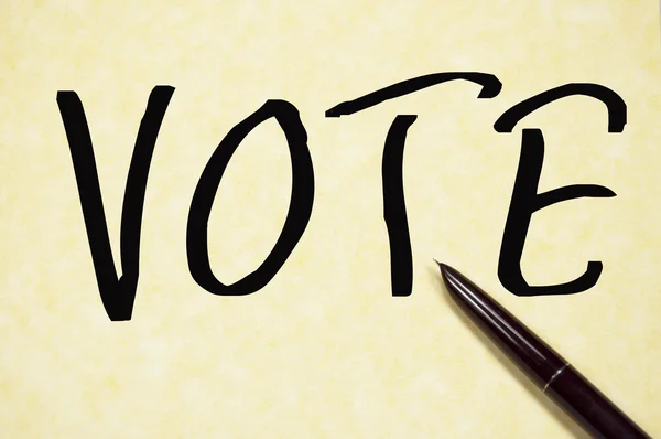 Omröstningen word skriva på papper — Stockfoto