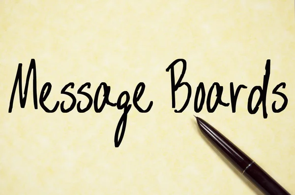 Message boards tekst schrijven op papier — Stockfoto
