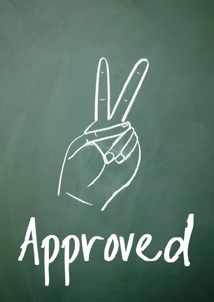 Approved gesture on blackboard — Stock Photo, Image