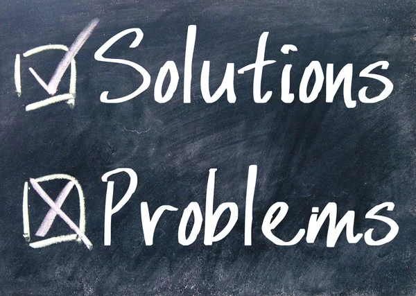 Solutions or problems choice on blackboard — Stock Photo, Image