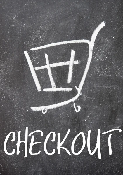 Checkout word and shopping cart sign on blackboard — Stock Photo, Image