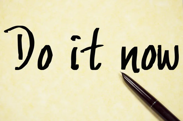 Do it now text write on paper — Stock Photo, Image