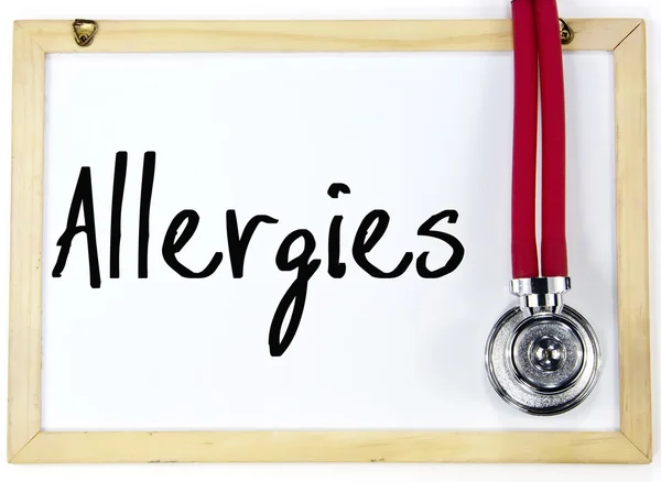 Allergies word write on blackboard — Stock Photo, Image