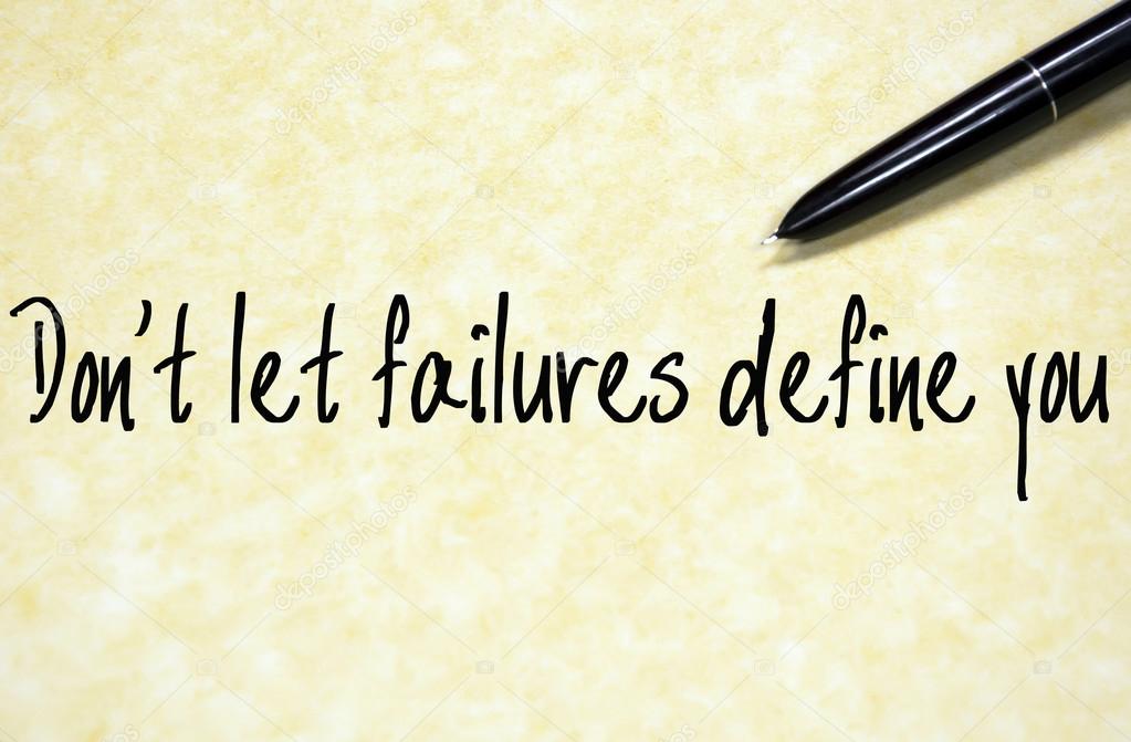 don't let failure define you text write on paper 