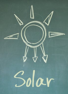 yazı tahtası üzerinde güneş işareti