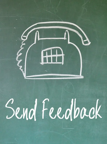 Send feedback sign on blackboard — Stock Photo, Image