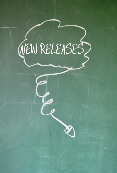 Cloud new release sign on blackboard — Stock Photo, Image