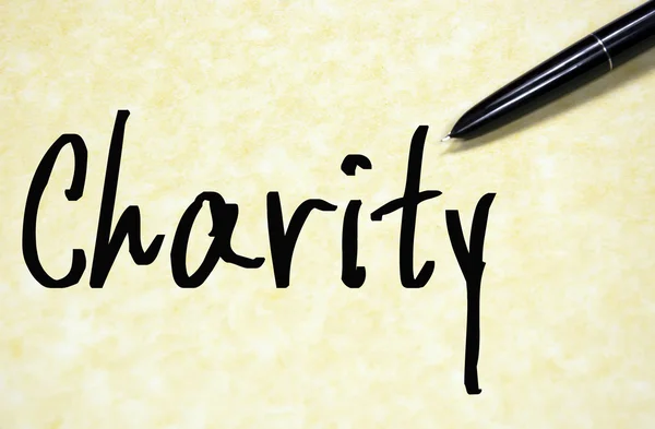 Charity word write on paper — Stock Photo, Image