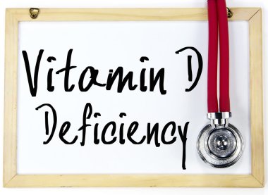 vitamin d deficiency text write on blackboard clipart