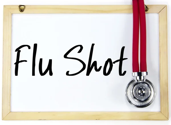 Flu shot text write on blackboard — Stock Photo, Image