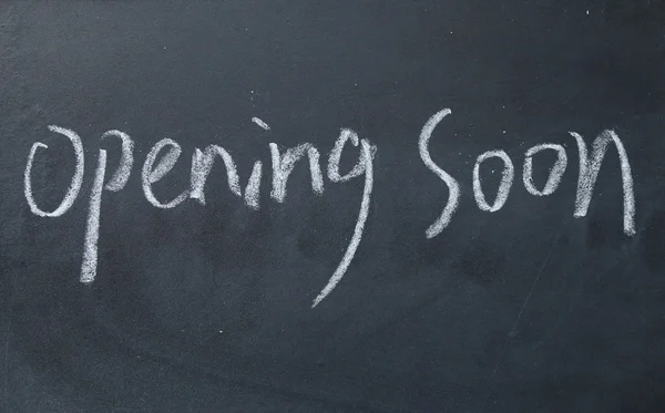 Opening soon text write on blackboard — Stock Photo, Image