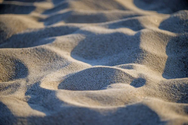 Zand van een strand met Shapes — Stockfoto