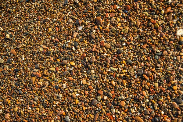 Guijarros piedras en una playa — Foto de Stock