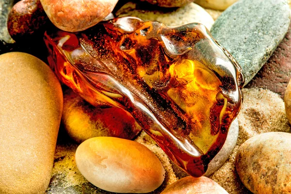 Amber on a beach of the Baltic Sea Stock Picture