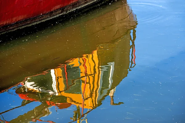 Reflection of a boat in a port — Stock Photo, Image