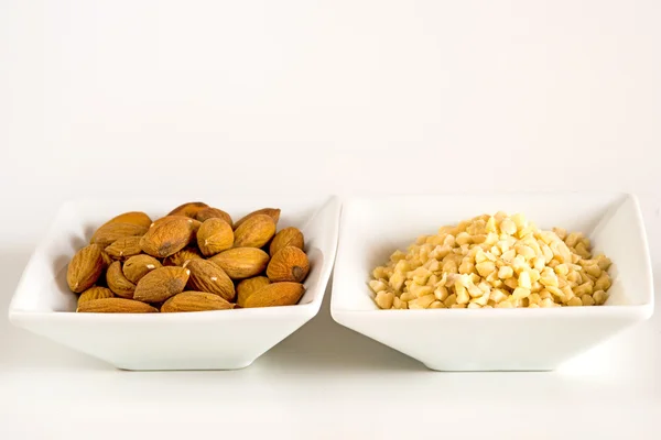 Almonds, whole and minced — Stock Photo, Image