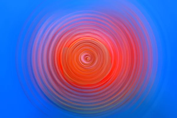 Spinning, colorful circle in red — Stock Photo, Image