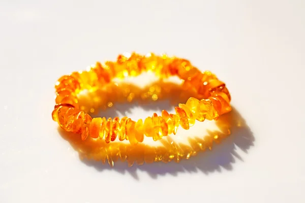 Amber bracelet in sun — Stock Photo, Image