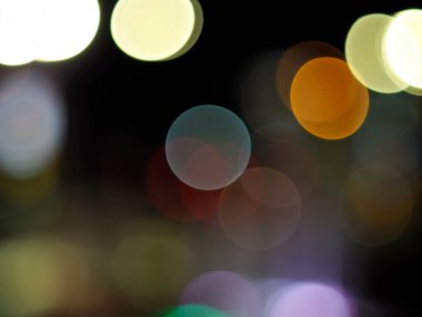 Festive bokeh background, soyut arkaplan ile bokeh sönmüş ışıklar, gece ışığı arka planında Defodaklanmış şehir manzarası