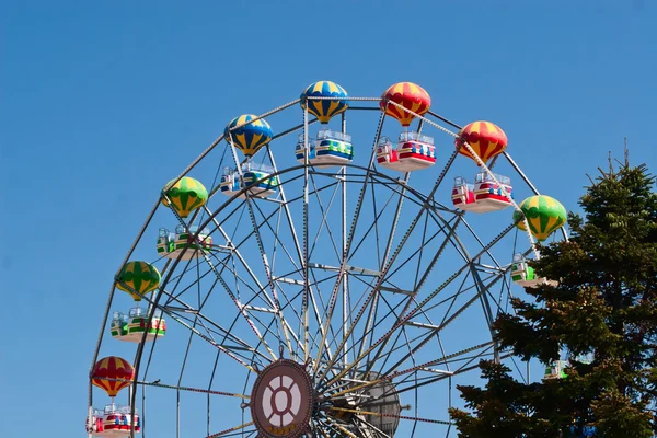 The attraction - a Ferris wheel in the resort town of Golden Sands in Bulgaria. Stock Photo