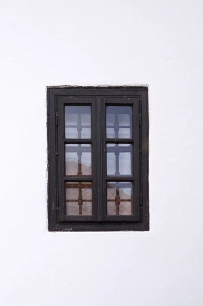 Old barred window — Stock Photo, Image